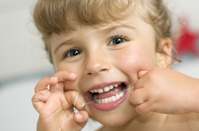 Child Flossing